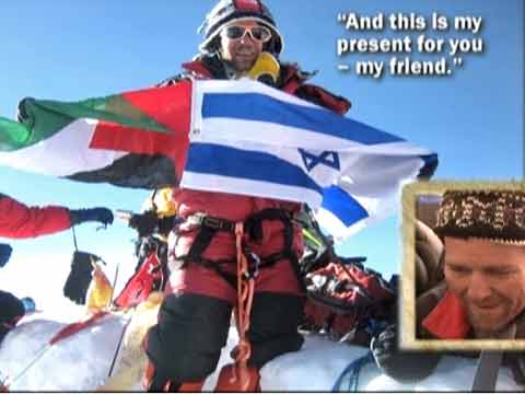 
Dudu Yifrah holding Palestinian and Israeli flags on Everest Summit May 18, 2006 - Everest: A Climb for Peace DVD
